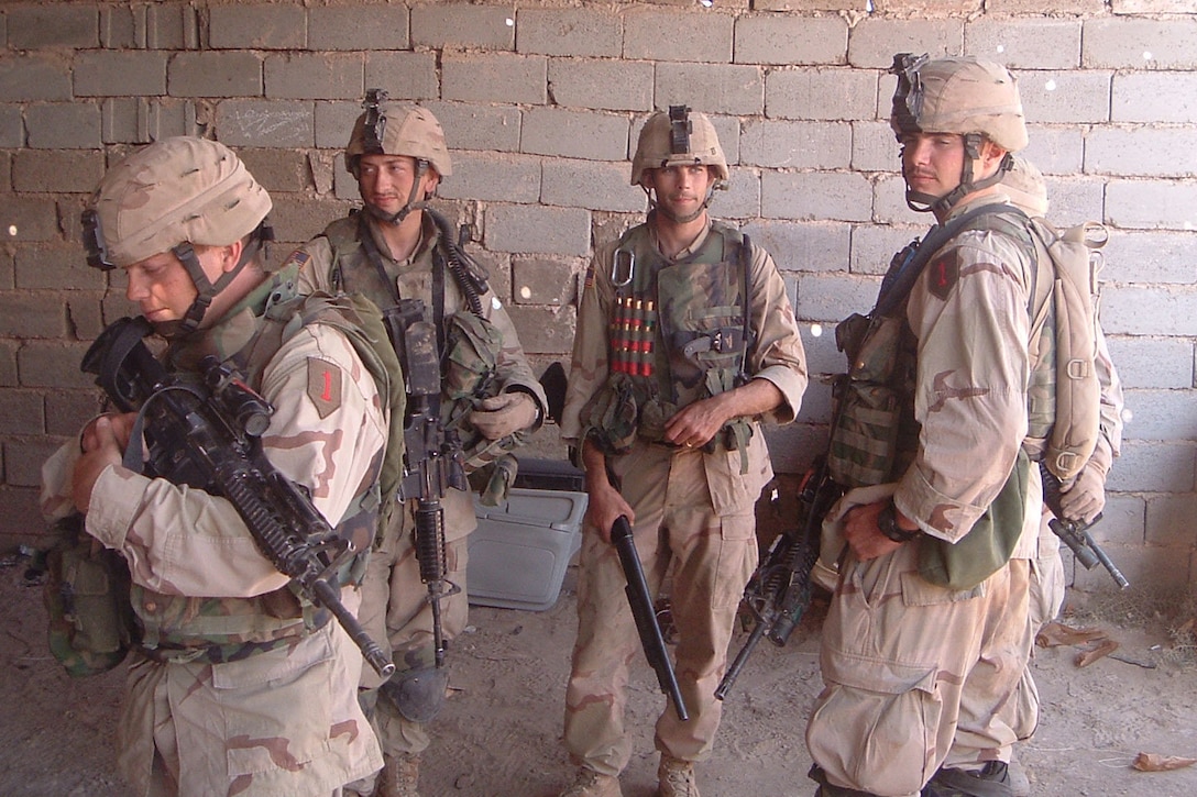 Soldiers pose for a photo.