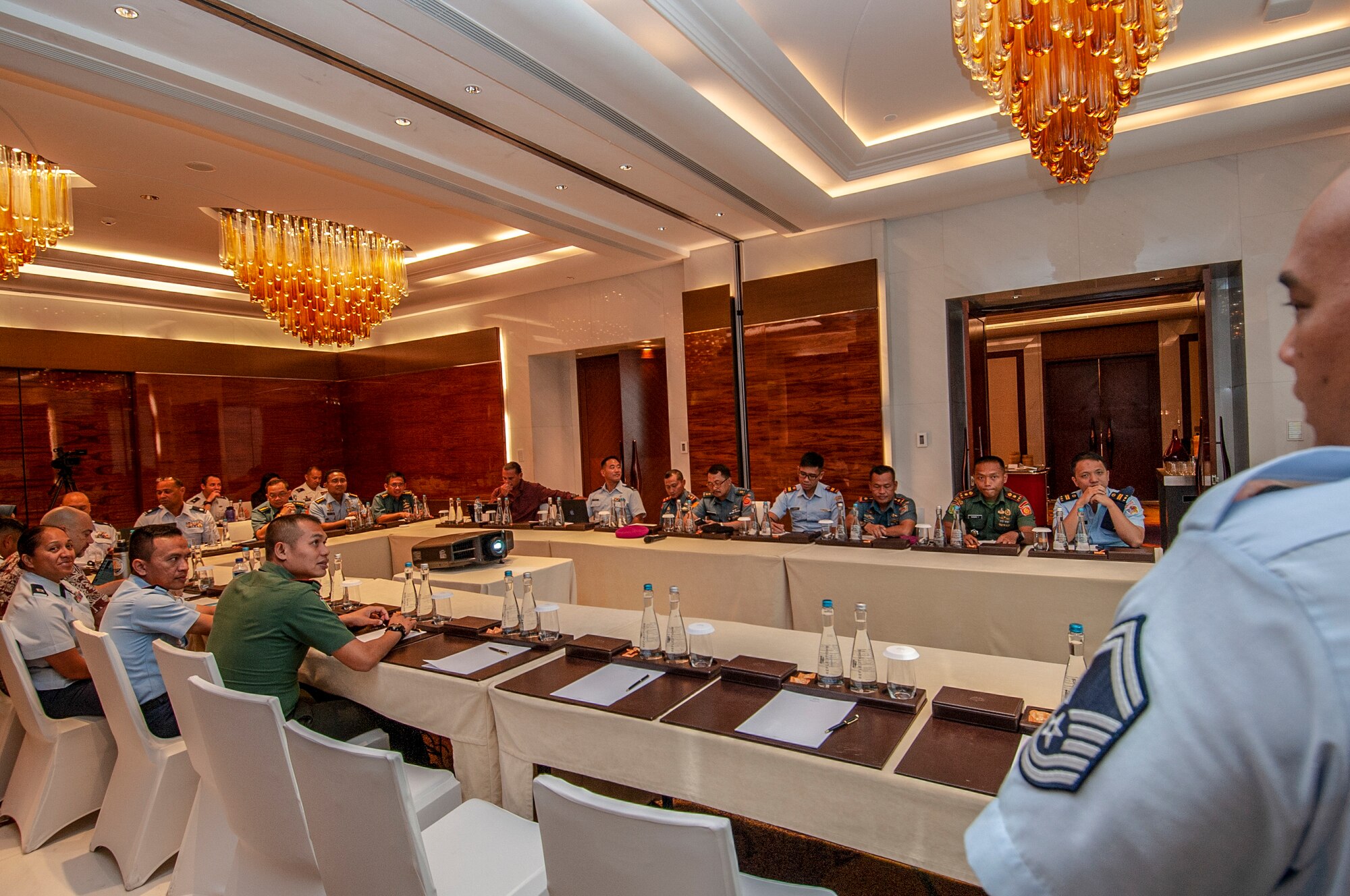 Senior Master Sgt. Jared Mina, 154th Medical Group Detatchment 1 medic conducts a briefing on search and rescue operations during a Pandemic Subject Matter Expert Exchange between the Hawaii Air National Guard and the Indonesian armed forces held Jun. 18, 2019 in Jakarta, Indonesia.