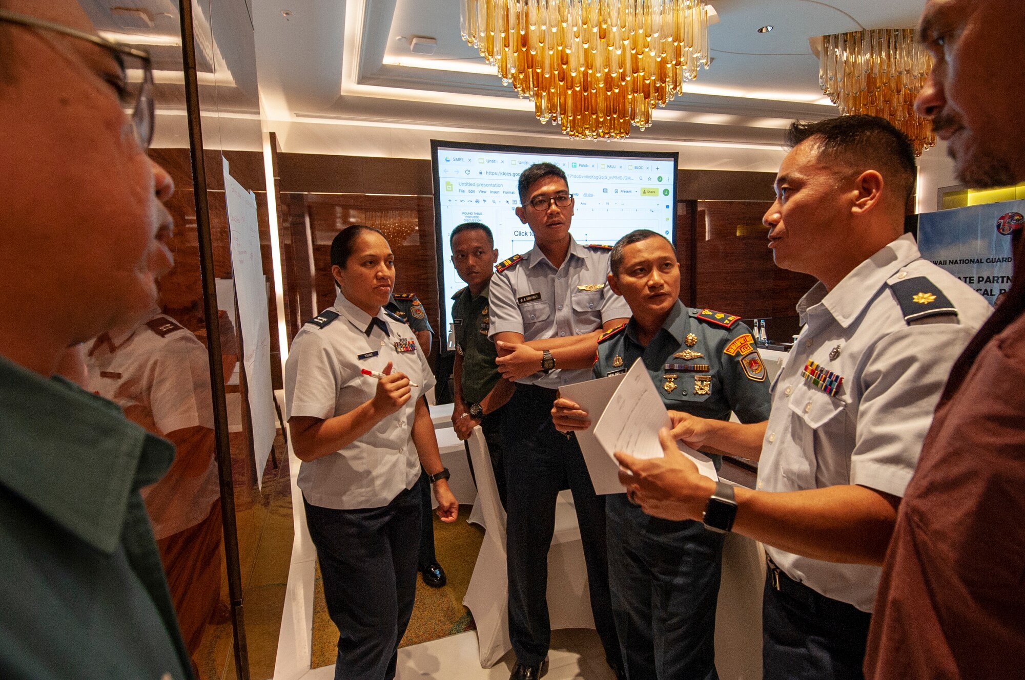 Medical experts from the Hawaii Air National Guard, Tentara Nasional Indonesia, and Hawaii Civil agencies brainstorm pandemic response strategies during a Pandemic Subject Matter Expert Exchange between the HIANG and Indonesian Armed Forces held Jun. 18 , 2019 in Jakarta, Indonesia.