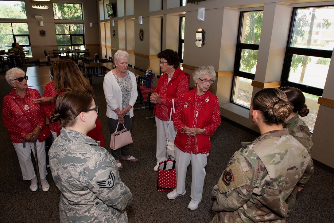 Team Travis Airmen meet with four “Rosie the Riveters” inside the Monarch Dining Facility June 25, 2019, at Travis Air Force Base, California. The Rosies all worked in the Richmond, California, Kaiser Shipyard during World War II. They were at Travis to meet with 60th Air Mobility Wing leadership, have lunch with Airmen and share their experiences. (U.S. Air Force photo by Tech. Sgt. James Hodgman)