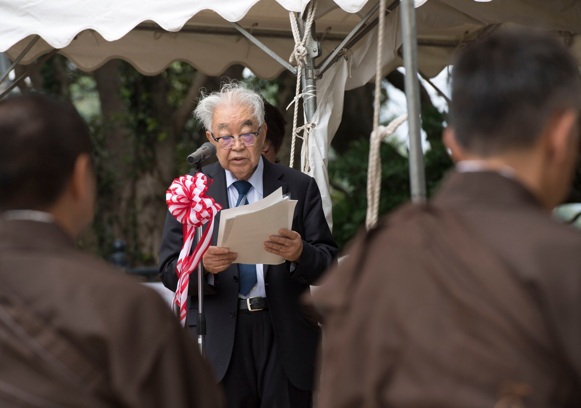 Dr. Hiroya Sugano, B-29 Memorial Ceremony host, speaks during the ceremony at Sengen Shrine in Shizuoka City, Japan, June 22, 2019.