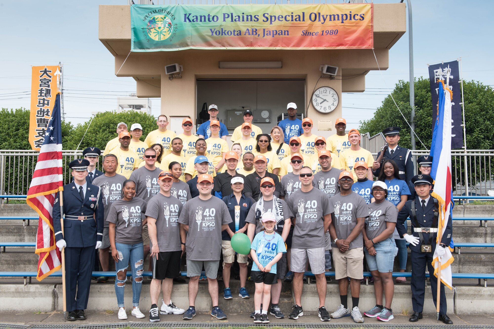 Members of Kanto Plains Special Olympics committee pose for a photo along with Honor Guard members from both the U.S. Air Force and Japan Self-Defense Force at Yokota Air Base, Japan, June 1, 2019.