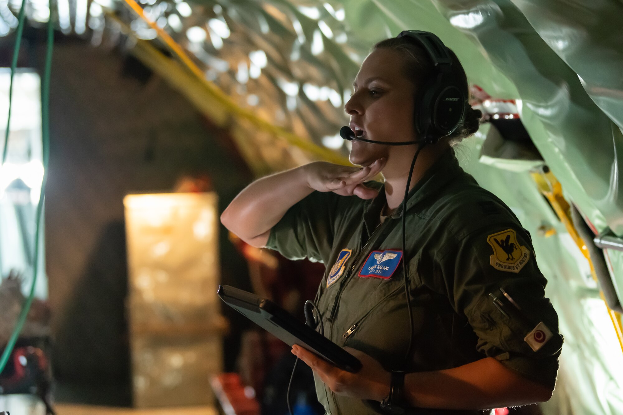 U.S. Air Force Capt. Lauren Kalani, 18 Aeromedical Evacuation Squadron flight nurse gives instruction on patient care onboard a KC-135 Stratotanker during an exercise May 8th, 2019, out of Kadena Air Base, Japan. The 18th AES deploys and operates elements of a theatre aeromedical evacuation system capable of worldwide taskings. (U.S. Air Force photo by Airman 1st Class Matthew Seefeldt)