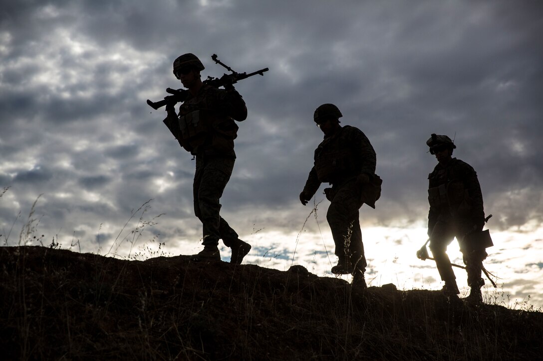 U.S. Marines with Special Purpose Marine Air-Ground Task Force-Crisis Response-Africa 19.2, Marine Forces Europe and Africa, prepare to conduct a squad attack on Campo De Maniobras, Base General Menacho, Spain, June 18, 2019. The Marines integrated with Spanish army operations to enhance interoperability with Spanish allies. SPMAGTF-CR-AF is deployed to conduct crisis-response and theater-security operations in Africa and promote regional stability by conducting military-to-military training exercises throughout Europe and Africa.