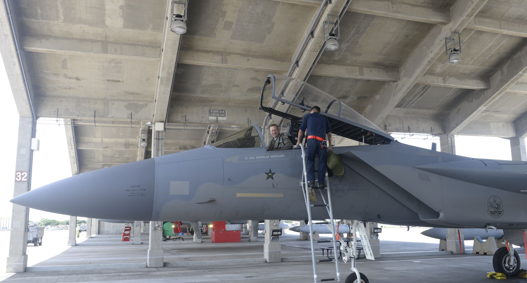 U.S. Air Force Brig. Gen. Case A. Cunningham, 18th Wing commander, climbs out of an F-15 Eagle after his fini-flight at Kadena Air Base, Japan, June 27, 2019.