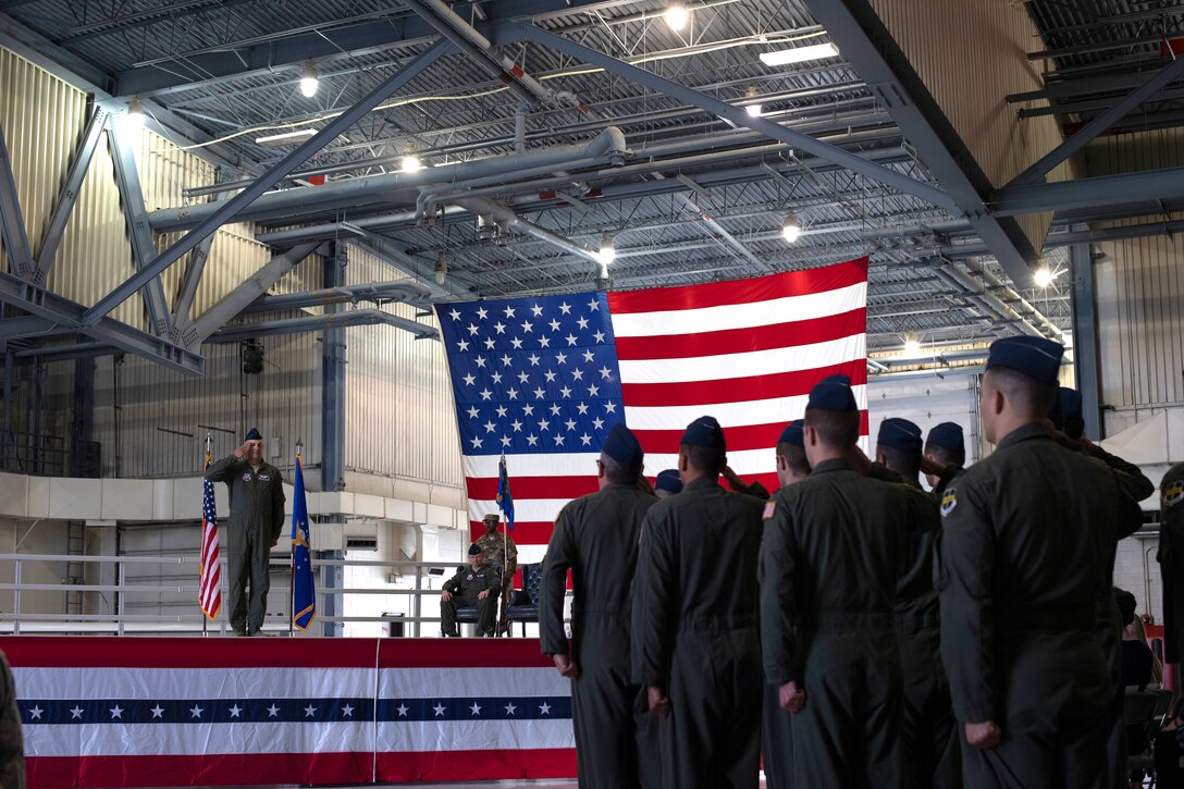 Lt. Col. Brandon Cieloha, 348th Reconnaissance Squadron commander, receives a first salute from members of the 348 RS following his assumption of command June 25, 2019, on Grand Forks Air Force Base, North Dakota. The 348 RS is responsible for conducting the RQ-4 Global Hawk mission, which provides a broad spectrum of intelligence, surveillance and reconnaissance collection capability to support joint combatant forces in worldwide peacetime, contingency and wartime operations. (U.S. Air Force photo by Senior Airman Elora J. Martinez)