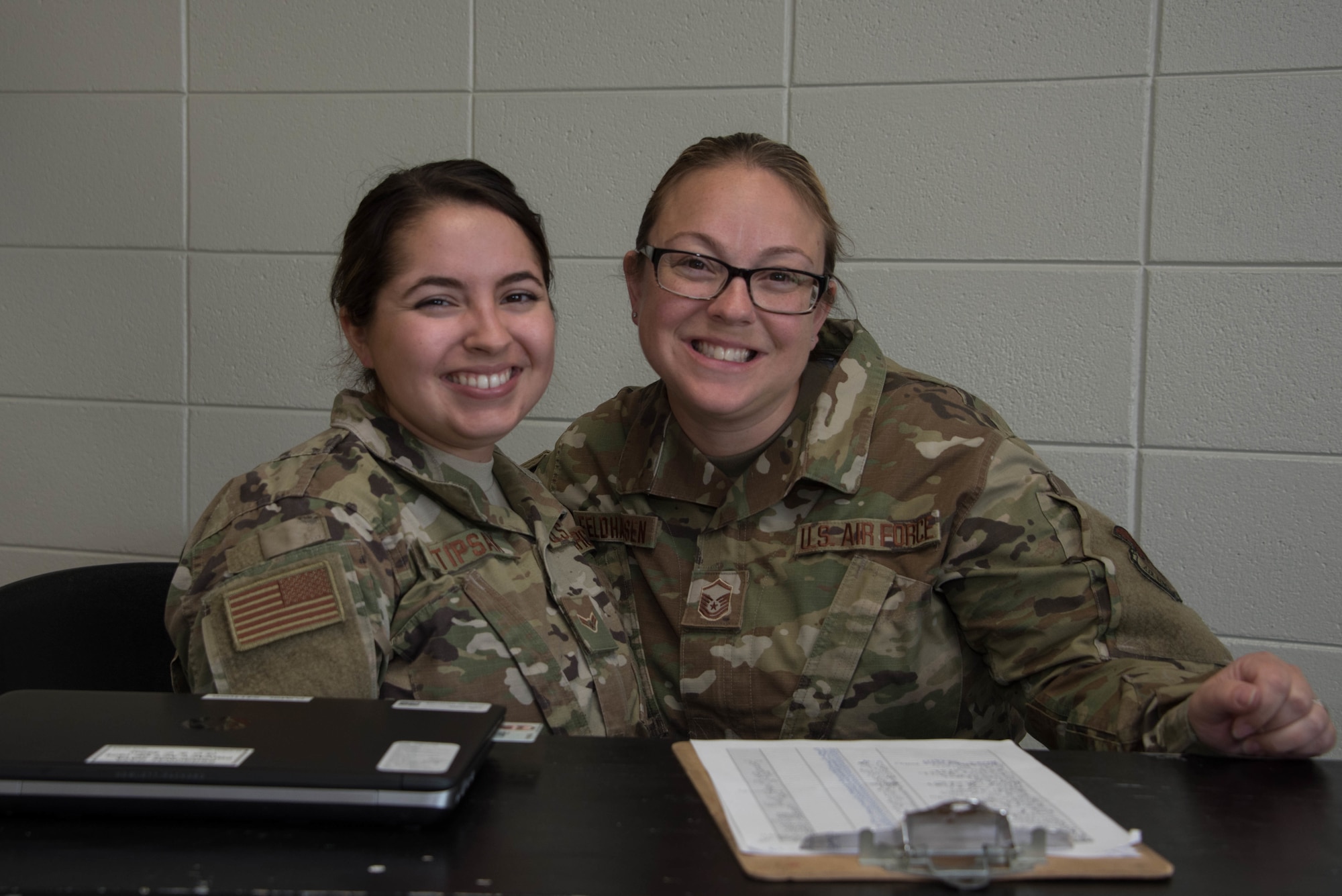 Air National Guard Airman 1st Class Kendall Stipsak, a medical administrator for the DAEOC Tri-State Innovative Readiness Training (IRT) 2019, and Air National Guard Master Sgt. Stephanie Feldhausen, the training noncommissioned officer in charge for the IRT, pose for a photo June 15, 2019, at Ballard Memorial High School in Barlow, Ky
