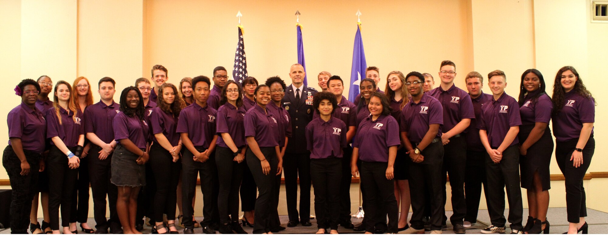 Maj. Gen. Brad Spacy (center), Air Force Installation and Mission Support Center commander, poses for a photo with installation and, in some cases, state military youth of the year winners during an awards ceremony at the conclusion of the 2019 Military Youth of the Year Summit in San Antonio June 17-21.