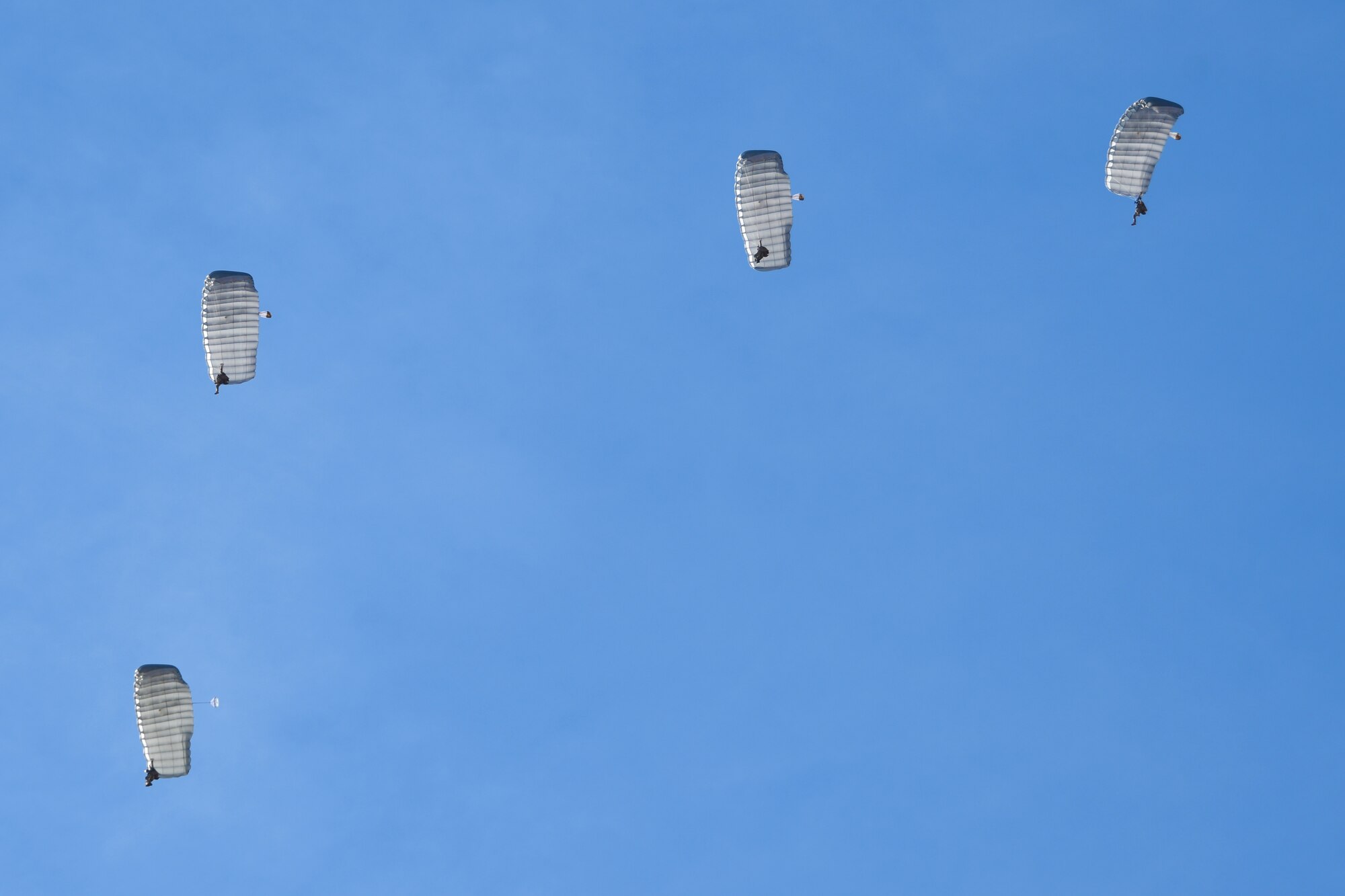 U.S. Air Force pararescuemen accomplishing their five-level upgrade training parachute into a drop zone at the Marana Regional Airport, Ariz., June 26, 2019.