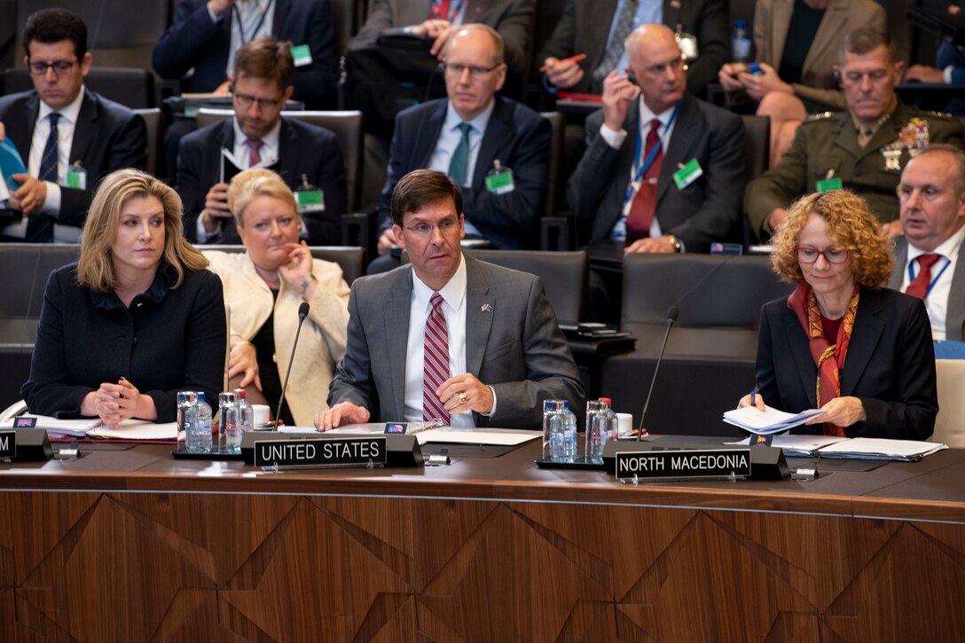 Acting Defense Secretary Dr. Mark T. Esper attends a meeting.