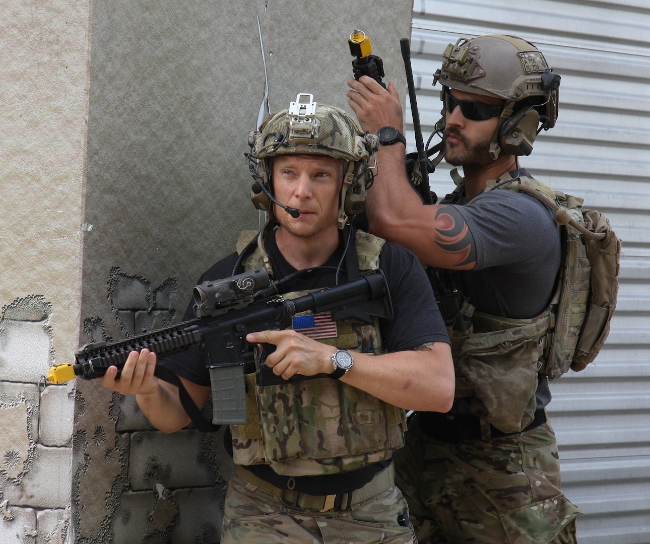 Special Forces Soldiers respond to enemy fire in a simulated village June 15 at Joint Base San Antonio-Camp Bullis during the 2019 Joint Emergency Medicine Exercise.  Emergency medicine doctors observe the military operation and how casualties are treated and evacuated from remote areas.