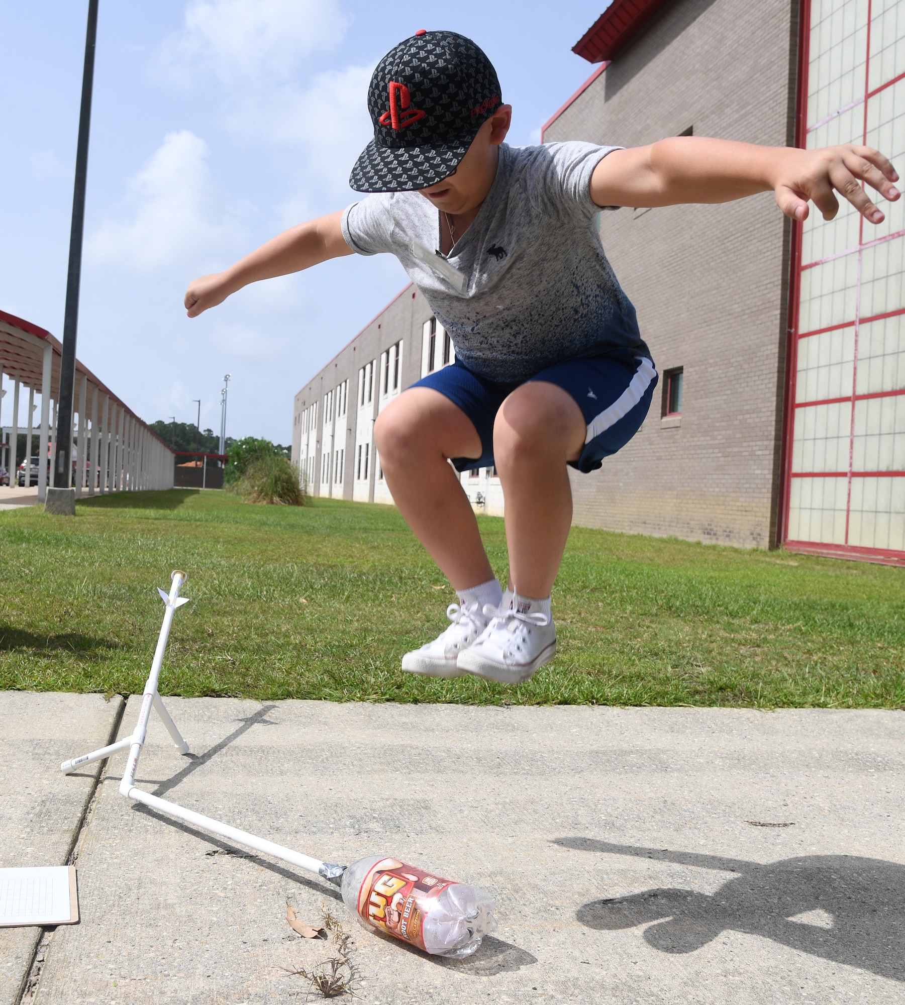 Michael Howell, Biloxi Junior High School seventh grader, launches a jet propulsion laboratory stomp rocket during the Biloxi Public Schools Science, Technology, Engineering and Mathematics Summer Camp program at Biloxi High School in Biloxi, Mississippi, June 25, 2019. The four-day STEM summer program teaches first through seventh grade students skills for future careers and fosters valuable life skills like problem solving, creativity and collaboration. Keesler personnel volunteered their time to lead instructions on various projects. (U.S. Air Force photo by Kemberly Groue)