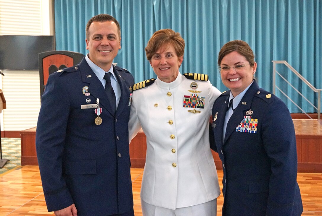 three people in uniform