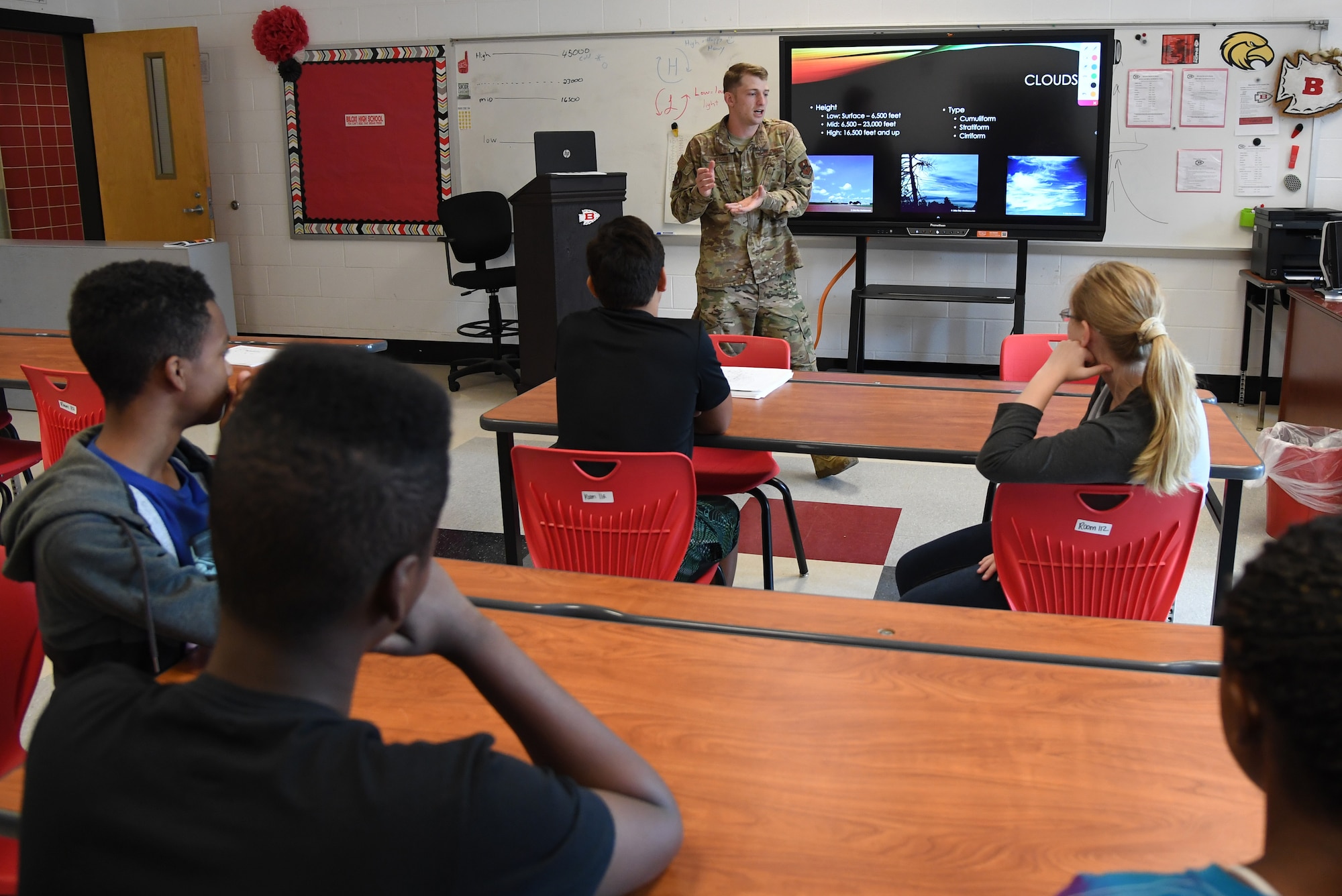 U.S. Air Force Tech. Sgt. Luke Bowersox, 335th Training Squadron army weather forecaster, delivers a weather forecasting brief during the Biloxi Public Schools Science, Technology, Engineering and Mathematics Summer Camp program at Biloxi High School in Biloxi, Mississippi, June 25, 2019. The four-day STEM summer program teaches first through seventh grade students skills for future careers and fosters valuable life skills like problem solving, creativity and collaboration. Keesler personnel volunteered their time to lead instructions on various projects. (U.S. Air Force photo by Kemberly Groue)