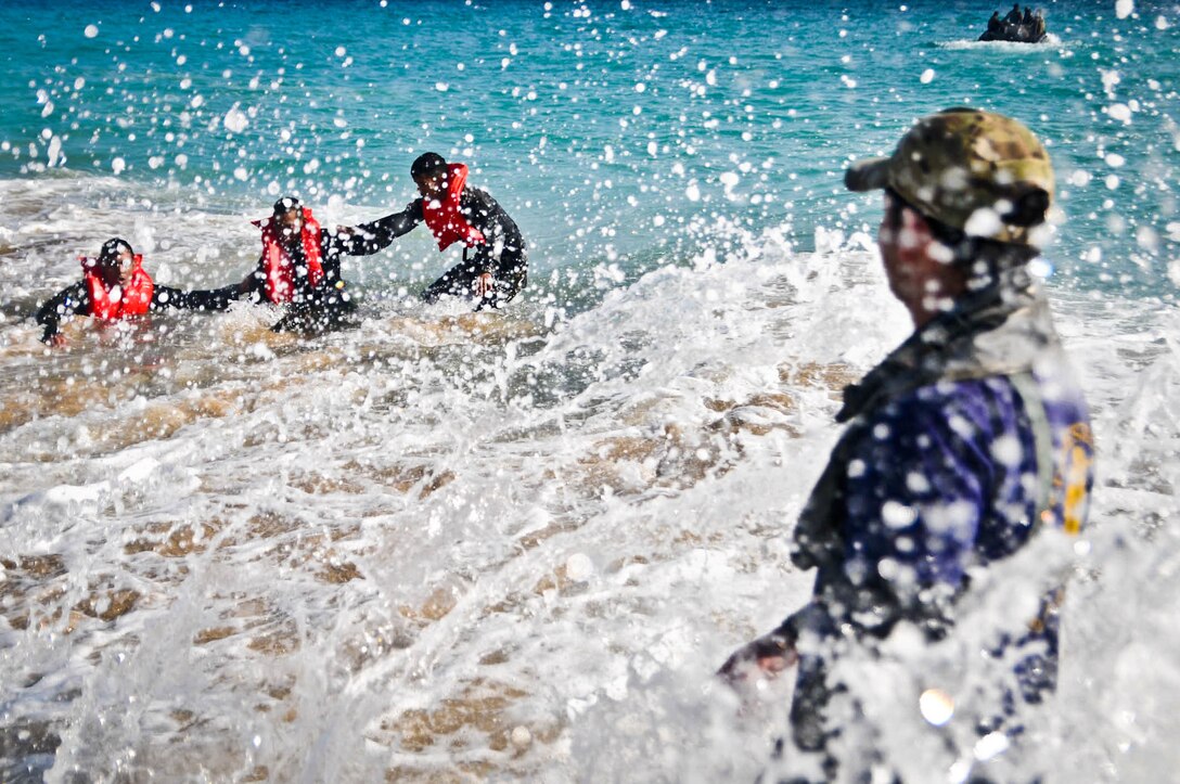 Competitors from Honduras continued to endure the mentally and physically challenging tests during the team event