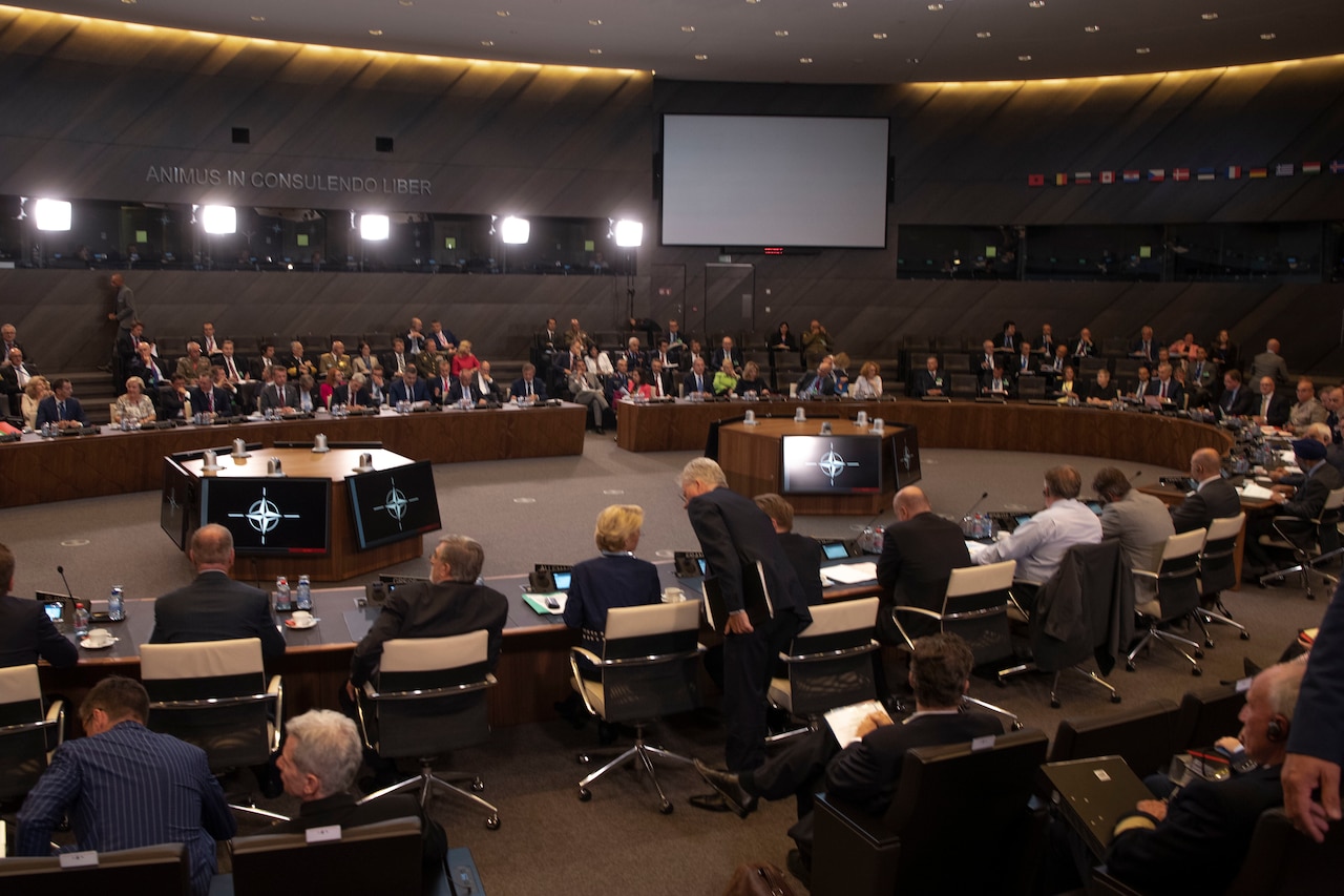 People sitting around a large circular table.