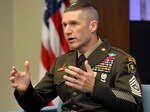 Sgt. Maj. of the Army Daniel Dailey speaks about retention and academic credentialing at the AUSA Institute of Land Warfare breakfast June 26 in Arlington, Virginia.