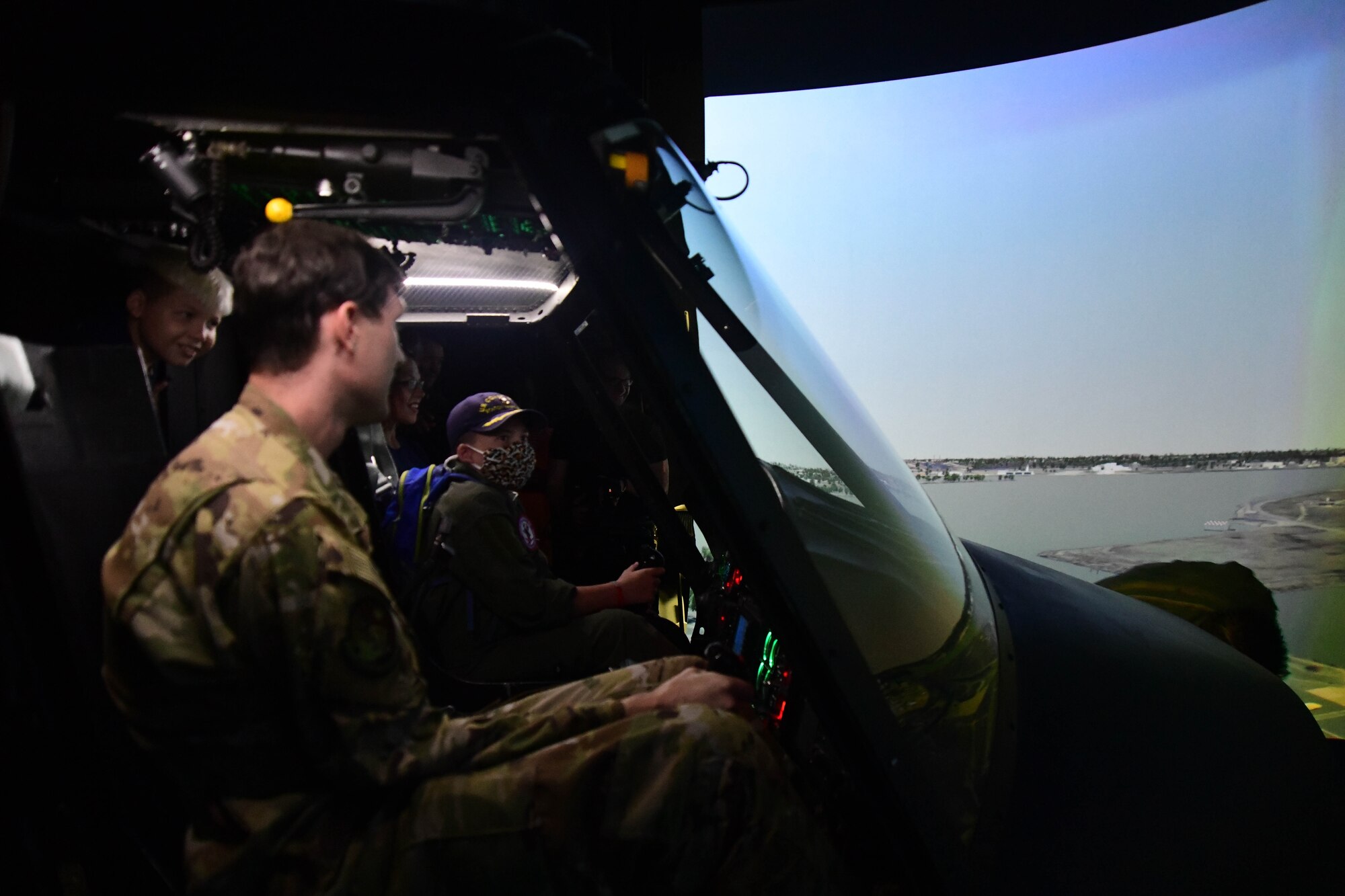 O’Rian Jolley, The Check-6 Foundation pilot for a day, flies a UH-1 simulator at the 1st Helicopter Squadron on Joint Base Andrews, June 26, 2019. O’Rian is the 27th Pilot for a Day at JBA. When he isn’t working to reach his goal of being a US Coast Guard rescue swimmer by routinely swimming and learning about the career, he raises money for research and awareness of mitochondrial diseases. He does this by creating and selling paracord ‘Hope Bracelets’ and giving them out for donations to his cause. He has so far raised over $1,000 for Children’s National Medical Center in Washington, DC. (U.S. Air National Guard photo by Erica Flores)