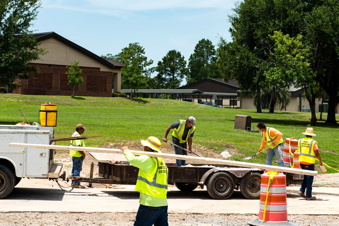 Construction workers make progress during a storm-drain construction project, June 26, 2019, at Moody Air Force Base, Ga. The 23d Civil Engineer Squadron spent $41,000 to improve the drainage system to prevent safety hazards caused by standing water. (U.S. Air Force photo by Senior Airman Erick Requadt)