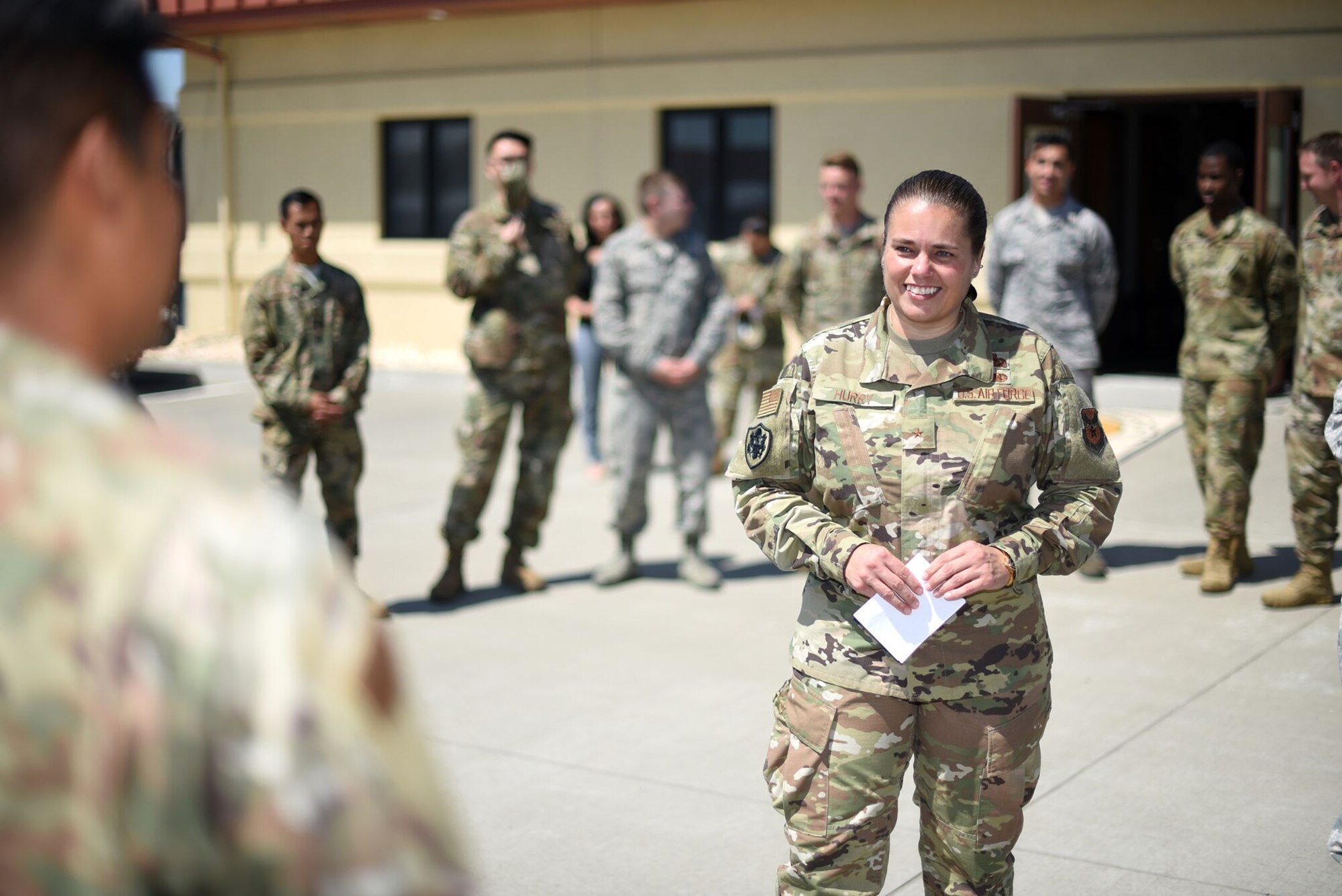 U.S. Air Force Brig. Gen. Linda Hurry, Defense Logistics Agency Aviation commander, speaks with Airman 1st Class Erick Zabalza, 60th Logistics Readiness Squadron fuels distribution operator, as part of her visit June 17, 2019, to Travis Air Force Base, California. Hurry's visit sought to empower Airmen-led innovation in which the Air Force has seen an uptick over the last year. (U.S. Air Force photo by Senior Airman Christian Conrad)