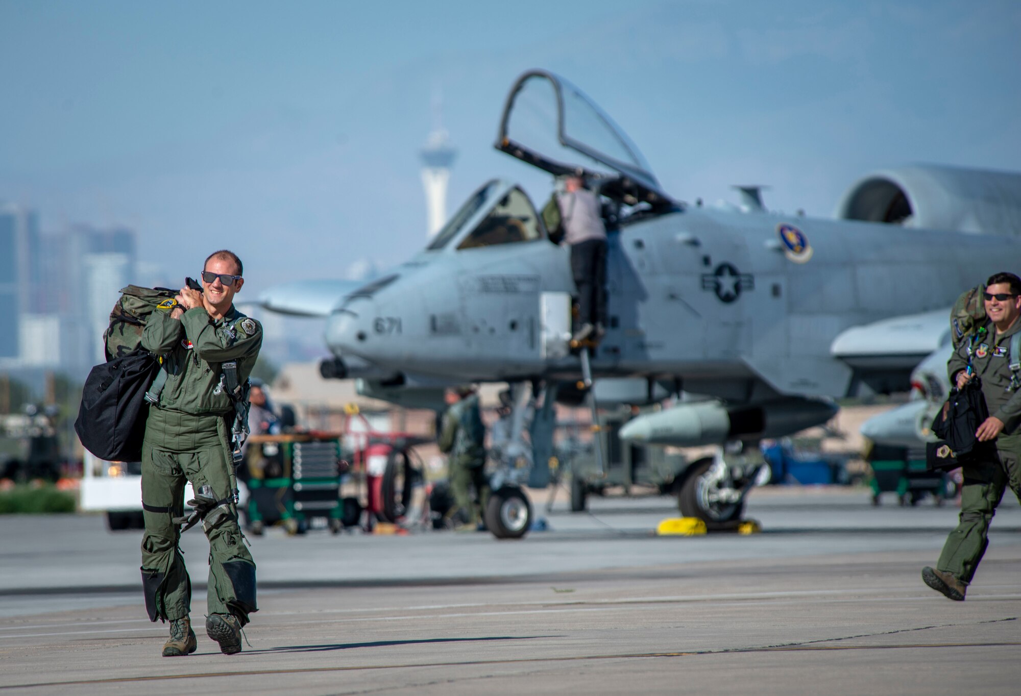 U.S. Air Force Lt. Col. James Kappes, 6th Combat Training Squadron (CTS) director of operations, and Capt. Eric Calvey, 6th CTS flight commander, walk out to their A-10 Thunderbolt II’s for a memorial flyover, Nellis Air Force Base, Nev., June 21, 2019. The memorial flyover honored 2nd Lt. James Lord, former P-47 Thunderbolt pilot, who was missing in action from Aug. 10, 1944 to summer of 2018. (U.S. Air Force photo by Staff Sgt. Tabatha McCarthy)