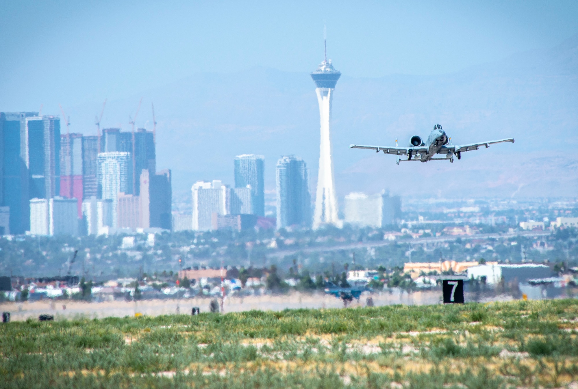 An A-10 Thunderbolt II takes off for a memorial flyover for World War II P-47 Thunderbolt pilot 2nd Lt. James Lord, Nellis Air Force Base, Nev., June 21, 2019. Lord was assigned to the 66th Fighter Squadron, 57th Fighter Group, when his plane crashed while engaging with the enemy Aug. 10, 1944. (U.S. Air Force photo by Staff Sgt. Tabatha McCarthy)