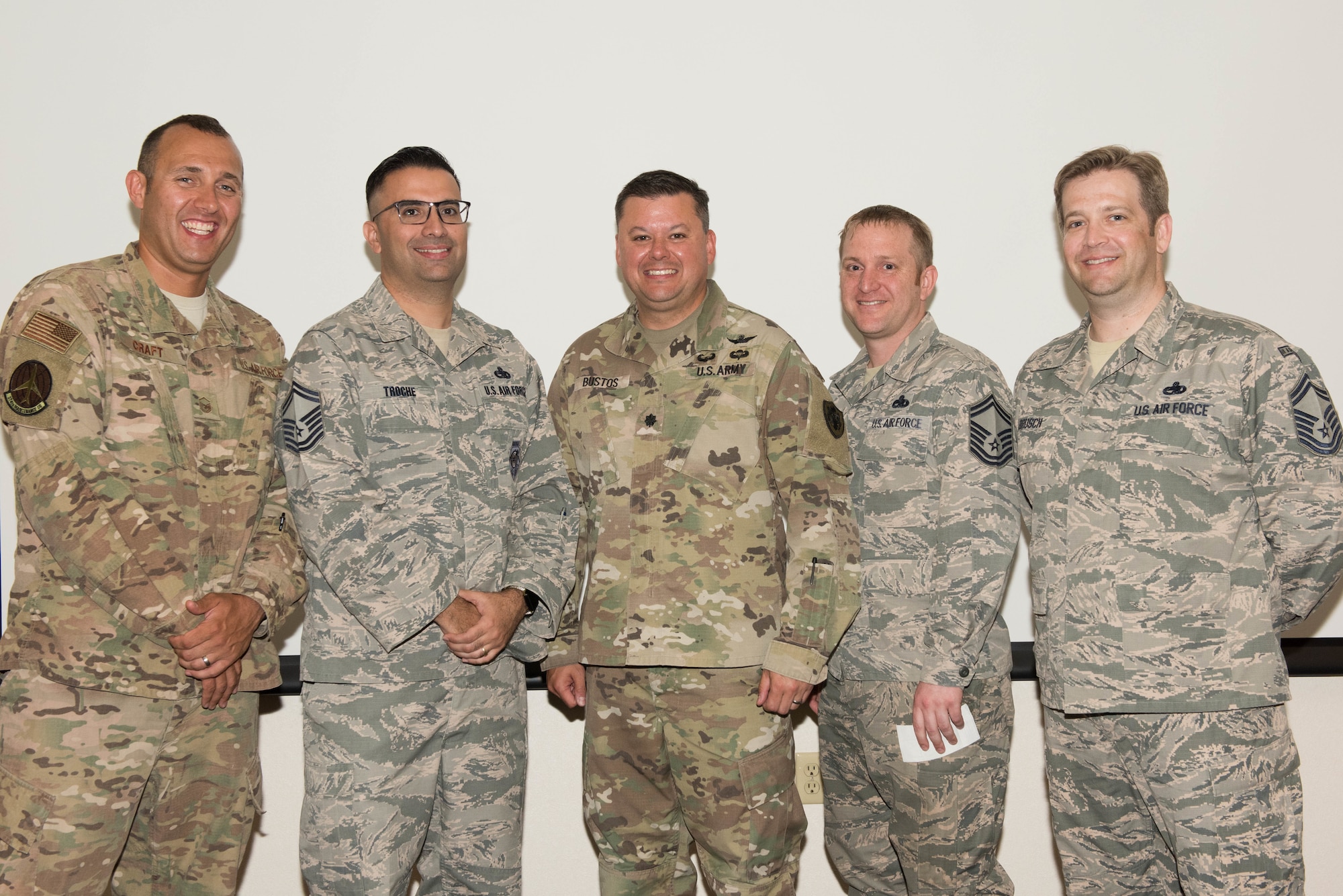 Kanto Plains Special Olympics 2019 executive committee members pose for a photo with a Knight of Columbus member, center, at Yokota Air Base, Japan, May 30, 2019.