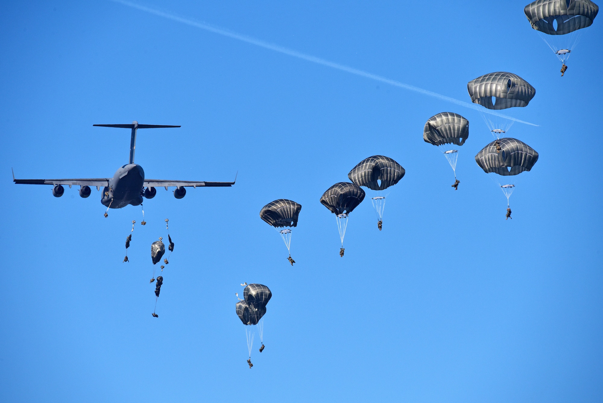 (Archive Photo) U.S. Army Paratroopers assigned to 1st Battalion, 503rd Infantry Regiment, 173rd Airborne Brigade, conduct an airborne operation from C17 Globemaster III Aircraft from Papa Air Base, Hungary, during exercise Eagle Sokol at Cerklje Drop Zone in Slovenia, Mar. 22, 2019. Exercise Eagle Sokol is a bilateral training exercise with the Slovenian Armed Forces focused on the rapid deployment and assembly of forces and team cohesion with weapon systems tactics and procedures. Exercises such as this build a foundation of teamwork and readiness between allied NATO countries. The 173rd Airborne Brigade is the U.S. Army Contingency Response Force in Europe, capable of projecting ready forces anywhere in the U.S. European, Africa or Central Commands' areas of responsibility. (U.S. Army Photos by Paolo Bovo)