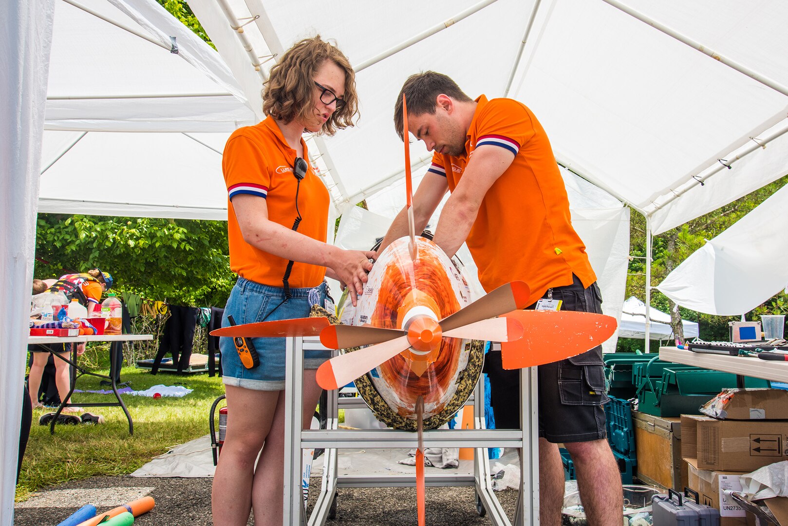 Wasub IX engineers Fien Pockele (left) and Niels Pynaert from the Netherlands evaluate their human-powered submarine before entering Naval Surface Warfare Center, Carderock Division’s David Taylor Model Basin for a wet inspection test in West Bethesda, Md., on June 25, 2019.