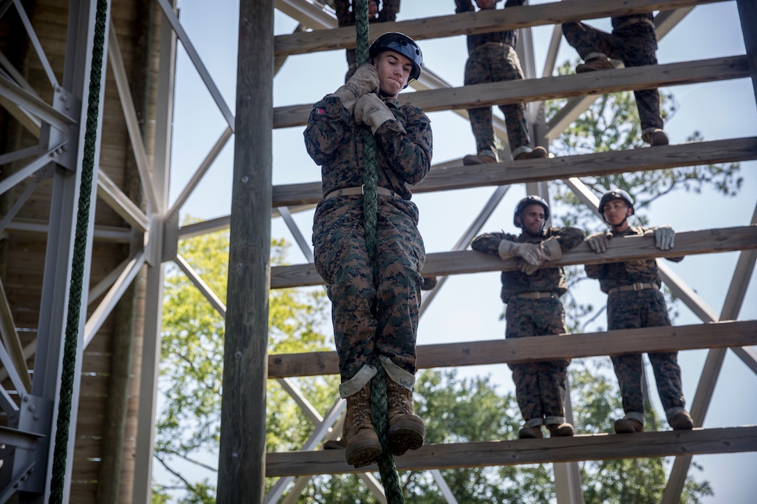 A recruit with Charlie Company, 1st Recruit Training Battalion, practices rappelling on Marine Corps Recruit Depot Parris Island, S.C., June 24, 2019. Recruits rappel from the 47-foot-tall tower wearing a safety harness, helmet and gloves to gain confidence and overcome any fear of heights. (U.S. Marine Corps photo by Lance Cpl. Christopher McMurry)