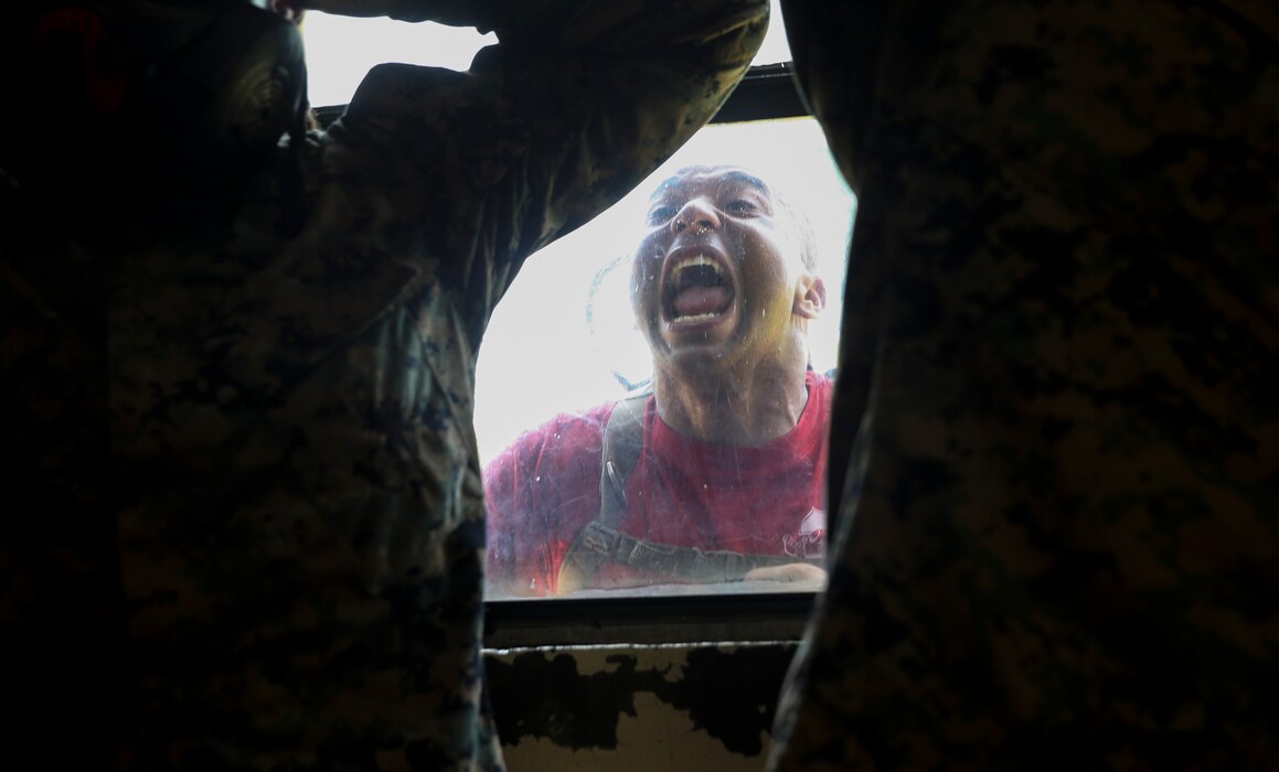 A drill instructor with Charlie Company, 1st Recruit Training Battalion, conducts chemical, biological, radiological, nuclear (CBRN) defense training at Marine Corps Recruit Depot, Parris Island, S.C., June 24, 2019. Training for CBRN defense is an event that recruits must complete in order to become United States Marines. (U.S. Marine Corps photo by Lance Cpl. Ryan Hageali/Released)