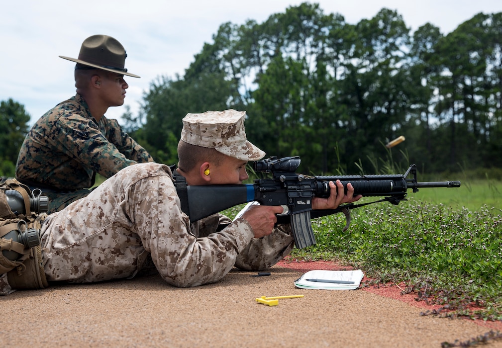 Recruits with Bravo Company, 1st Recruit Training Battalion, and Papa Company, 4th Recruit Training Battalion, pre-qualify for the rifle range on Parris Island, S.C., June 26, 2019. For one week, recruits learn and practice the fundamentals of marksmanship before moving on to shooting live ammunition during range week. (U.S. Marine Corps Photo by Lance Cpl. Christopher McMurry)
