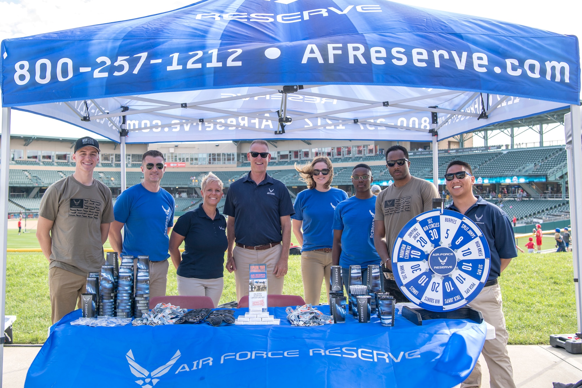 Col. Larry Shaw, 434th Air Refueling Wing commander, center, along with Airmen and recruiters from the 434th Air Refueling Wing pose for a group photo during an Indians baseball game in Indianapolis, Indiana June 25, 2019. The wing is continually using innovative recruiting practices in an effort to keep positions filled at Grissom. (U.S. Air Force photo/Master Sgt. Ben Mota)