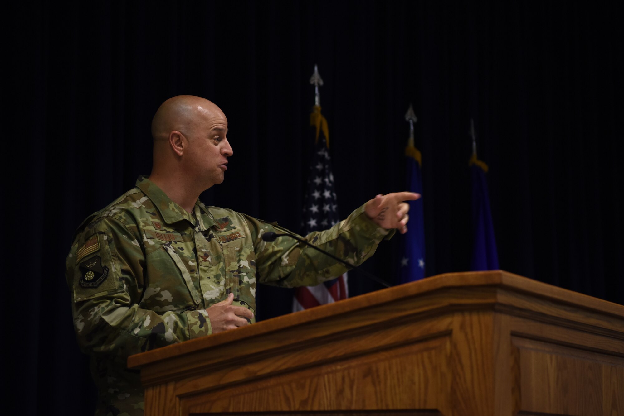 U.S. Air Force Col. Sloan Hollis, Air Force Inspection Agency commander, gives remarks during the AFIA change of command ceremony at Kirtland Air Force Base, N.M., June 27, 2019. At the ceremony, Hollis took command of AFIA from Col. Mark Pye. (U.S. Air Force photo by Senior Airman Eli Chevalier)
