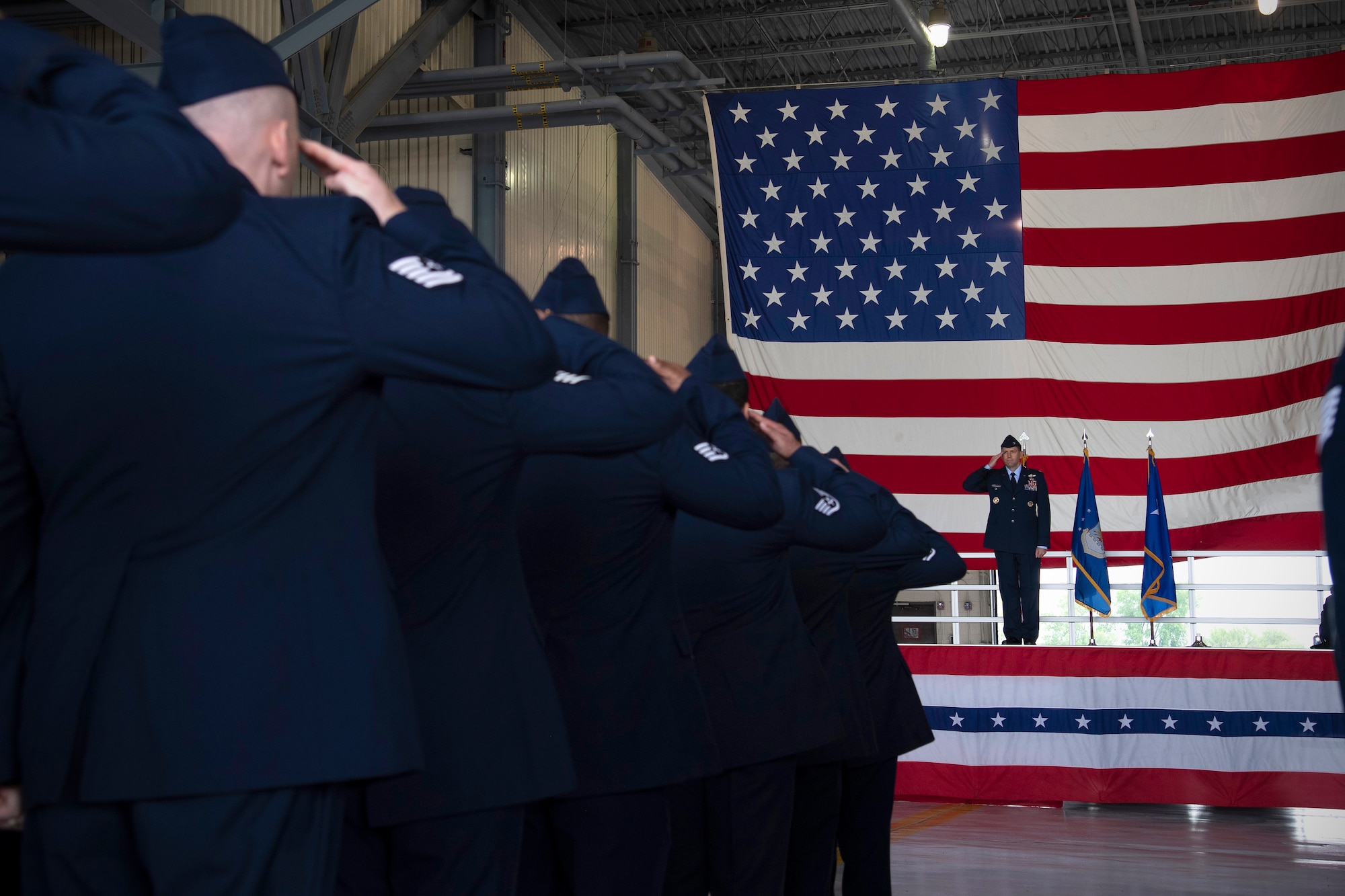 Col. Cameron Pringle, 319th Air Base Wing commander, recieves a first salute from the 319th Air Base Wing formation during a change of command ceremony for the wing June 28, 2019, on Grand Forks Air Force Base, North Dakota.