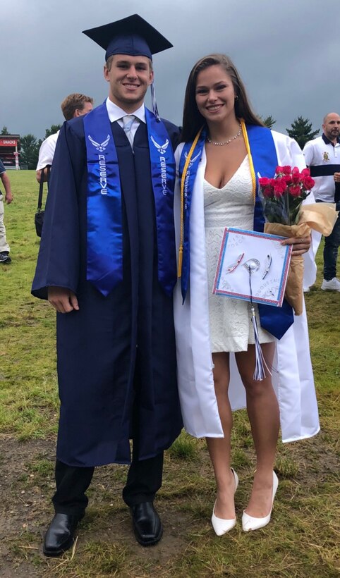 James Choff and Desiree Bouch, graduates of Burgettstown High School and Air Force Reserve Recruits, stand after their graduation ceremony wearing Air Force Reserve sashes over their graduation gowns June 10, 2019. Choff and Bouch both will be stationed at the 911th Airlift Wing, Choff with the 911th Civil Engineering Squadron and Bouch with the 911th Aircraft Maintenance Squadron. (U.S. Air Force courtesy photo)