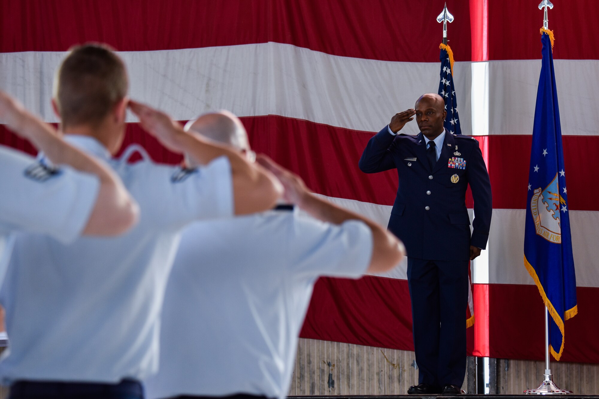 U.S. Air Force Col. Gregory Coleman, incoming 377th Medical Group commander, renders his first salute to his Airmen in a change of command ceremony at Kirtland Air Force Base, N.M., June 27, 2019. The mission of the 377th MDG is to advance the human weapons system, promote optimal health, and provide trusted care to Team Kirtland. (U.S. Air Force photo by Airman 1st Class Austin J. Prisbrey)