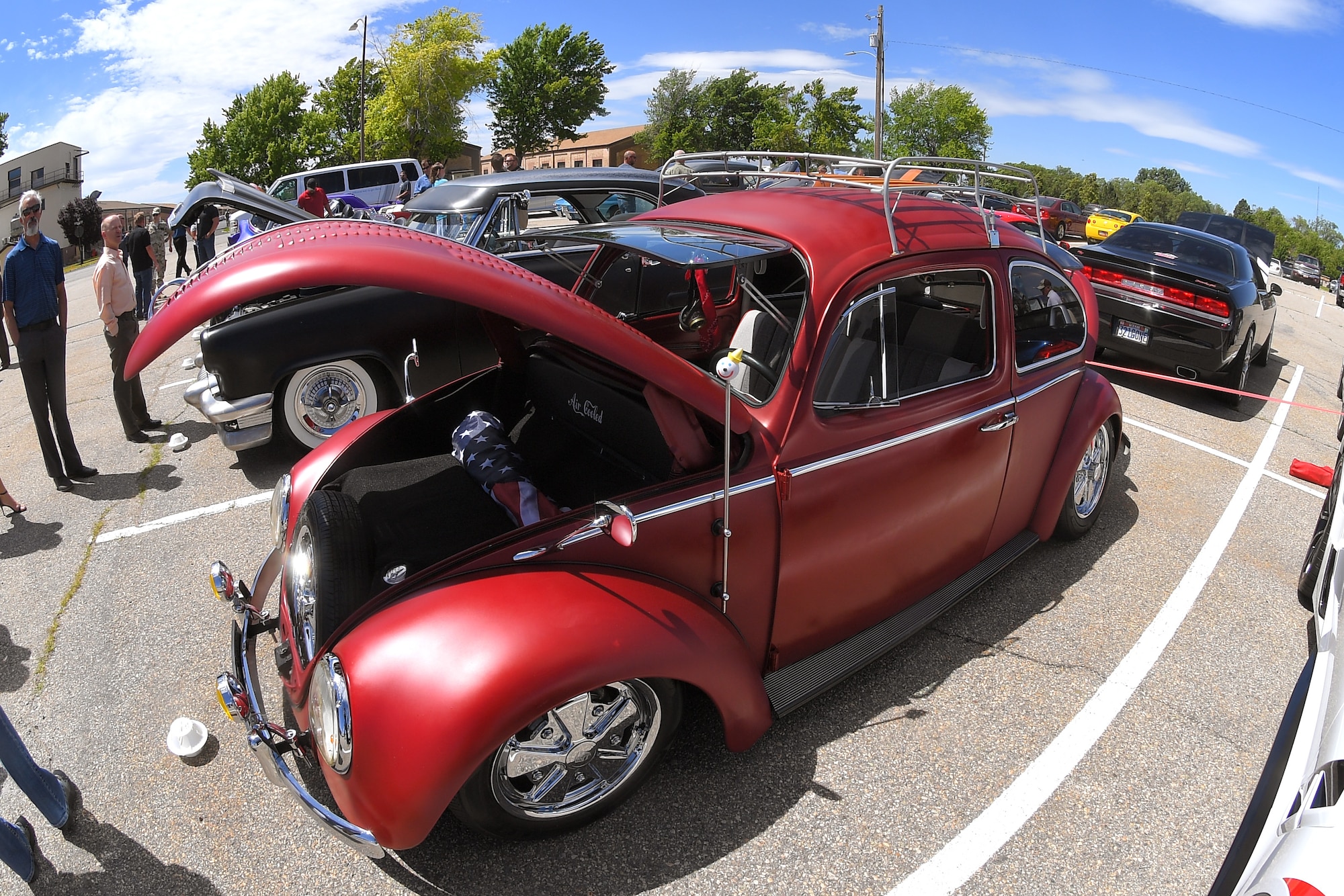 A custom Volkswagen beetle displayed at a car show and barbecue hosted by the base’s Foreign Military Sales organization at Hill Air Force Base, Utah, June 27, 2019. The event was a first for the unit, and several program teams and employees displayed and shared details with visitors about their vehicles. (U.S. Air Force photo by Todd Cromar)