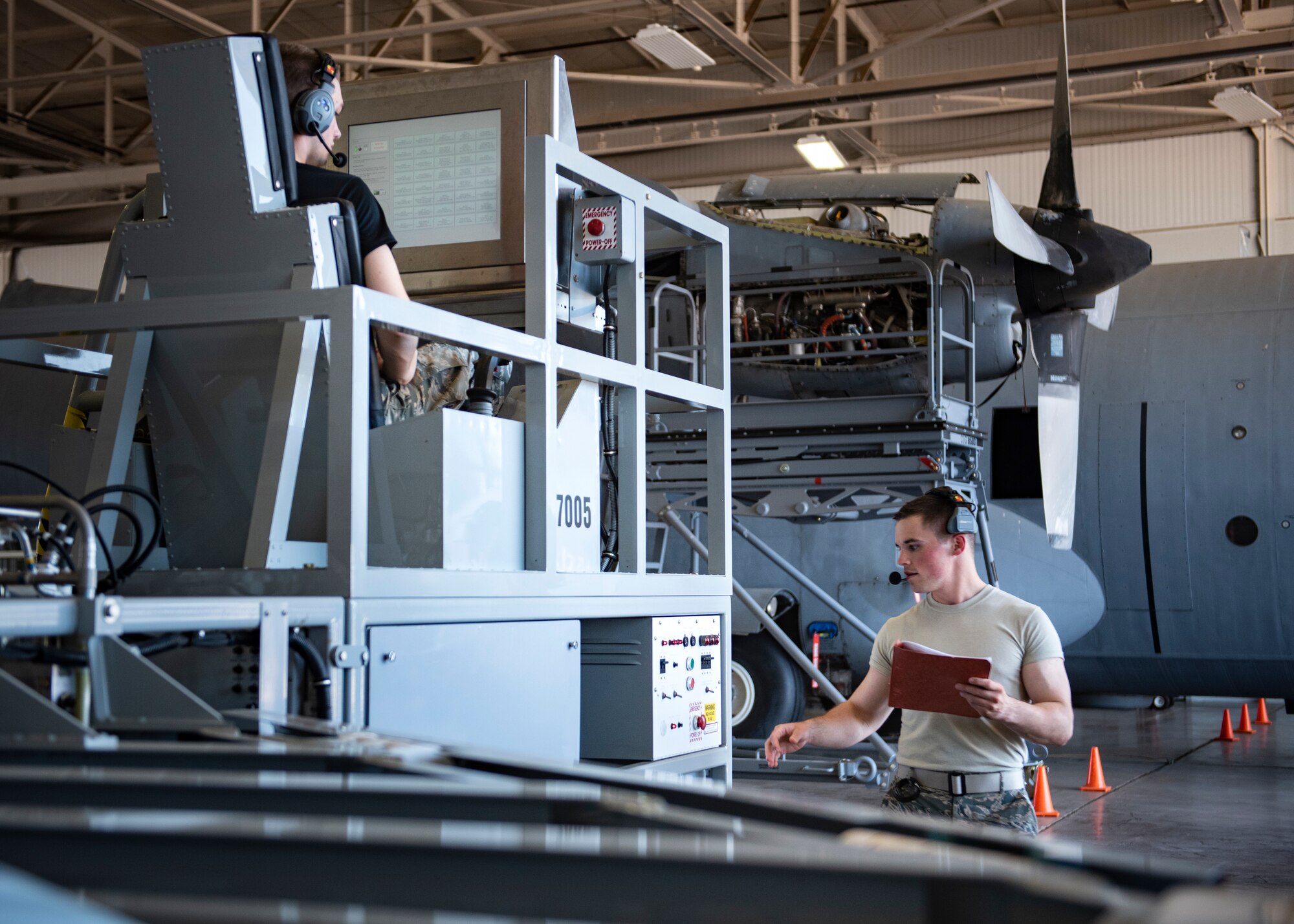 Airman 1st Class Kyle Jaycox, above, and Airman 1st Class Matthew Higgs, 364th Training Squadron hydraulic systems apprentice course students, troubleshoot the hydrualic systems in a flight control simulator at Sheppard Air Force Base, Texas, June 28, 2019. Jaycox plays the role of the pilot, activating the systems in the "flightdeck" as Higgs looks for any discrepancies on the ground. (U.S. Air Force photo by Airman 1st Class Pedro Tenorio)
