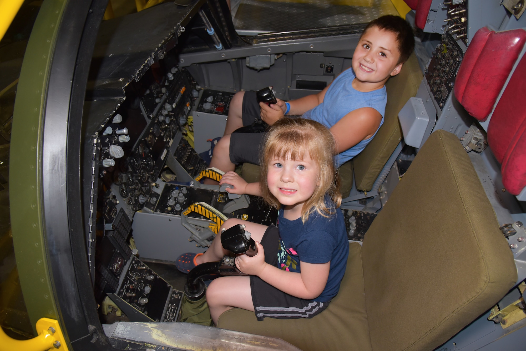 DAYTON, Ohio - Museum visitors enjoying the FB-111A Sit-in Cockpit in the Cold War Gallery at the National Museum of the U.S. Air Force. (U.S. Air Force photo)