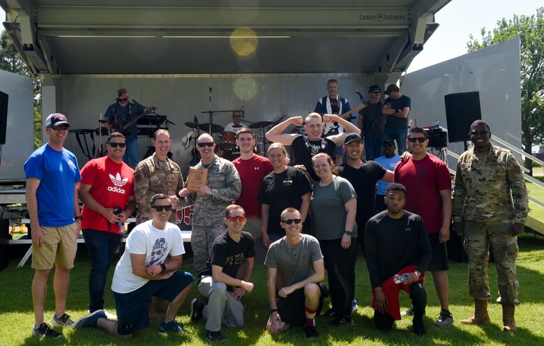 PETERSON AIR FORCE BASE, Colo.—Members of the 21st Wing Staff Agency take home the first place large unit award during the 2019 Team Pete Sports and Field day June 21, 2019 on Peterson Air Force Base, Colorado. Awards were separated into small, medium and large unit awards, with first, second and third place awards in all categories. (U.S. Air Force photo by Airman Alexis Christian)
