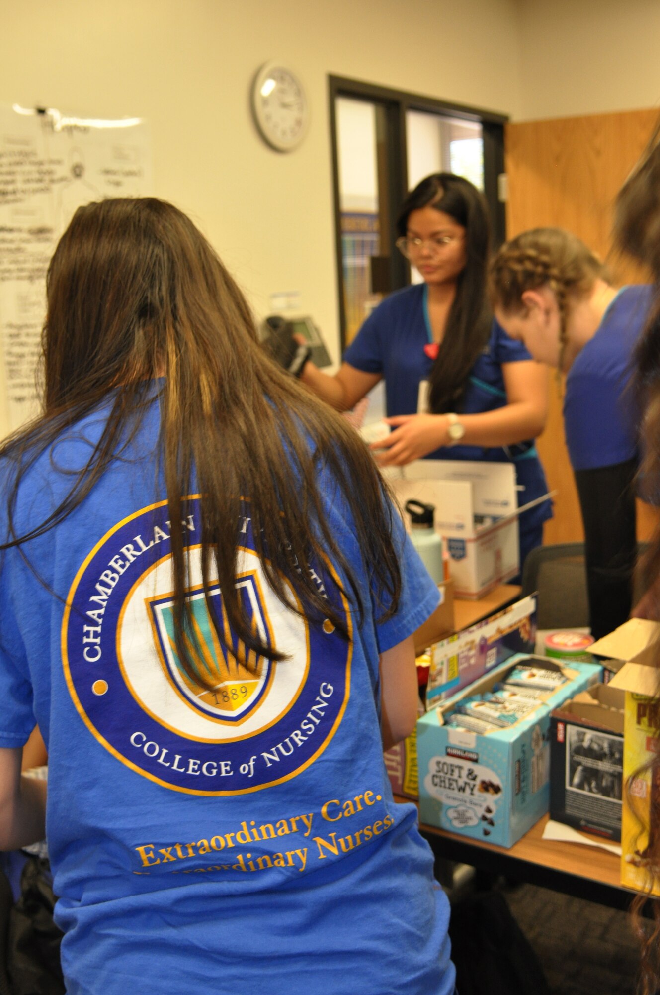 Nearly 50 students, family members and spouses created care packages at Chamberlain University June 20, 2019 in Las Vegas.