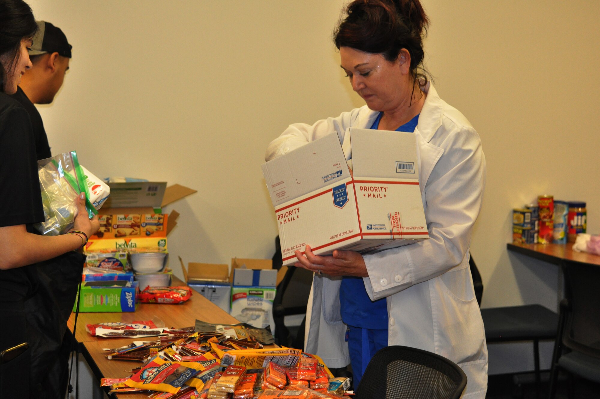 Nearly 50 students, family members and spouses created care packages at Chamberlain University June 20, 2019 in Las Vegas.