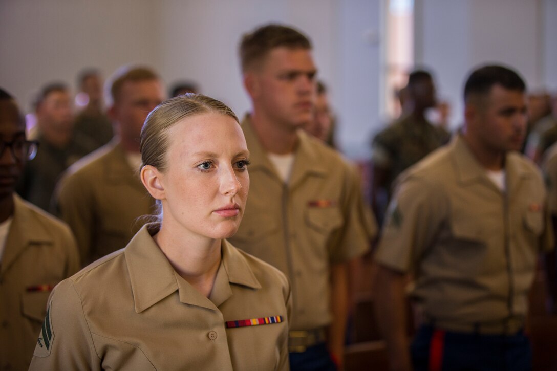 U.S. Marines stationed at Marine Corps Air Station (MCAS) Yuma graduate from Corporals Course 6-19 at the station chapel on MCAS Yuma, Ariz., June 21, 2019. Corporals Course is a 3-week long professional military education class designed to teach Marine Corporals the fundamentals of being a noncommissioned officer and the leadership skills necessary to lead Marines. (U.S. Marine Corps photo by Lance Cpl. John Hall)