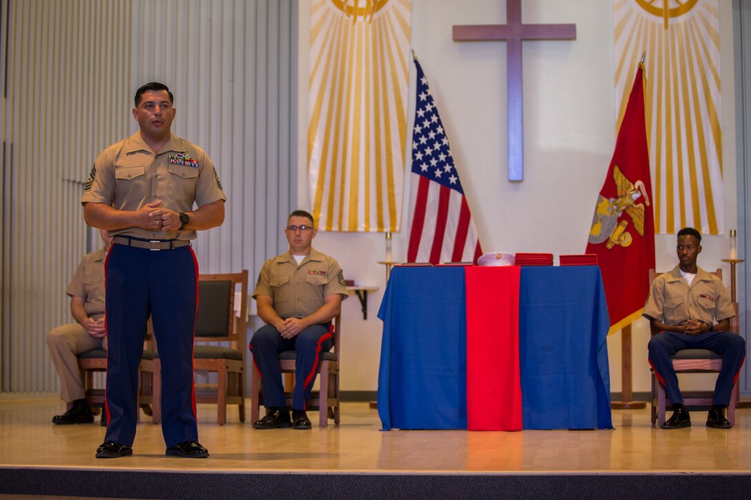 U.S. Marines stationed at Marine Corps Air Station (MCAS) Yuma graduate from Corporals Course 6-19 at the station chapel on MCAS Yuma, Ariz., June 21, 2019. Corporals Course is a 3-week long professional military education class designed to teach Marine Corporals the fundamentals of being a noncommissioned officer and the leadership skills necessary to lead Marines. (U.S. Marine Corps photo by Lance Cpl. John Hall)