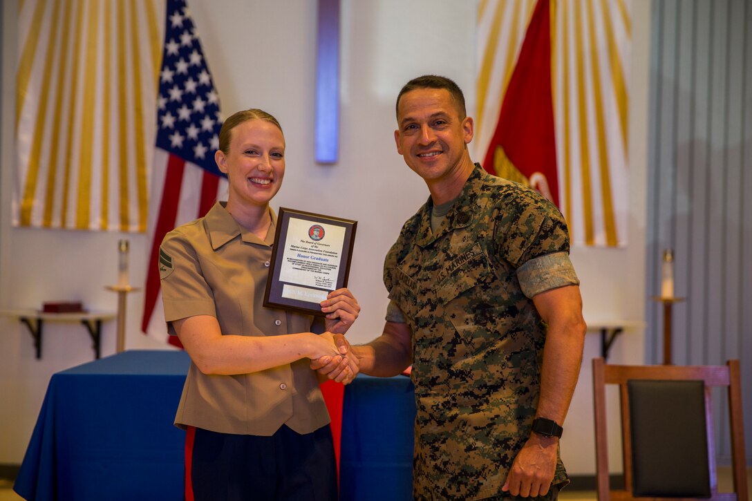 U.S. Marines stationed at Marine Corps Air Station (MCAS) Yuma graduate from Corporals Course 6-19 at the station chapel on MCAS Yuma, Ariz., June 21, 2019. Corporals Course is a 3-week long professional military education class designed to teach Marine Corporals the fundamentals of being a noncommissioned officer and the leadership skills necessary to lead Marines. (U.S. Marine Corps photo by Lance Cpl. John Hall)