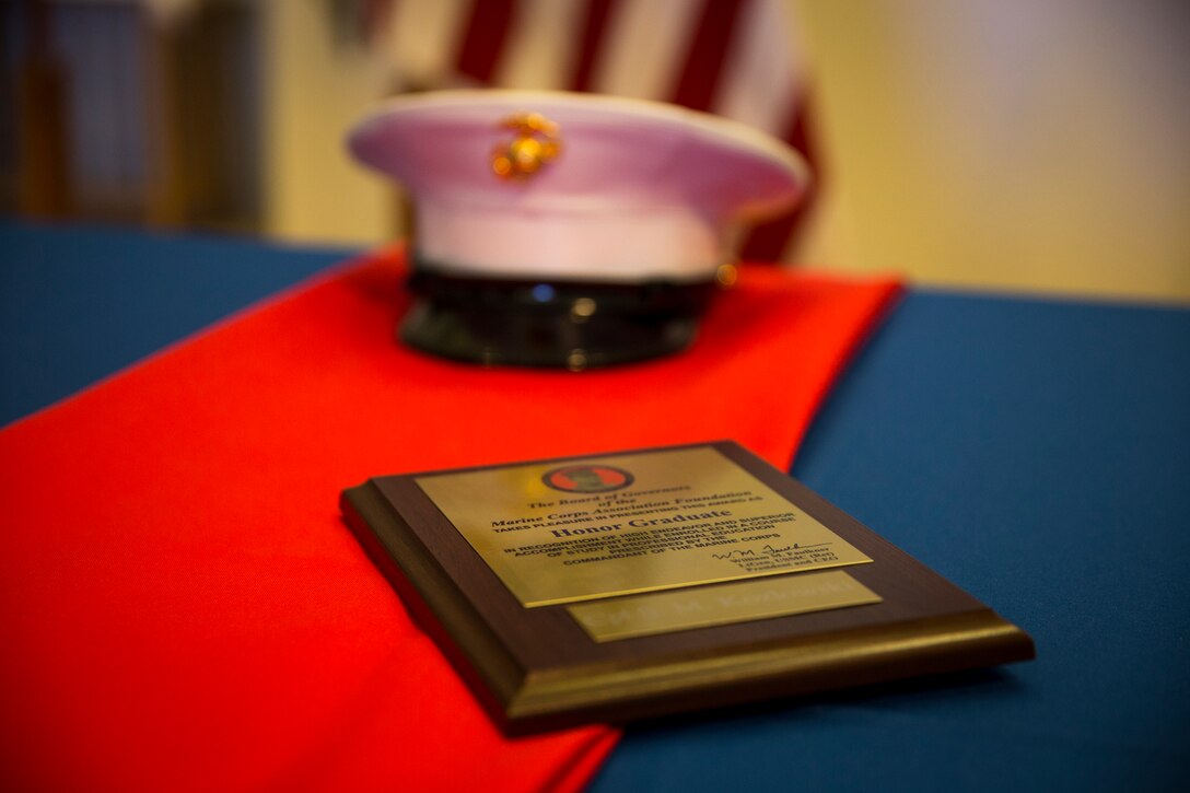 U.S. Marines stationed at Marine Corps Air Station (MCAS) Yuma graduate from Corporals Course 6-19 at the station chapel on MCAS Yuma, Ariz., June 21, 2019. Corporals Course is a 3-week long professional military education class designed to teach Marine Corporals the fundamentals of being a noncommissioned officer and the leadership skills necessary to lead Marines. (U.S. Marine Corps photo by Lance Cpl. John Hall)