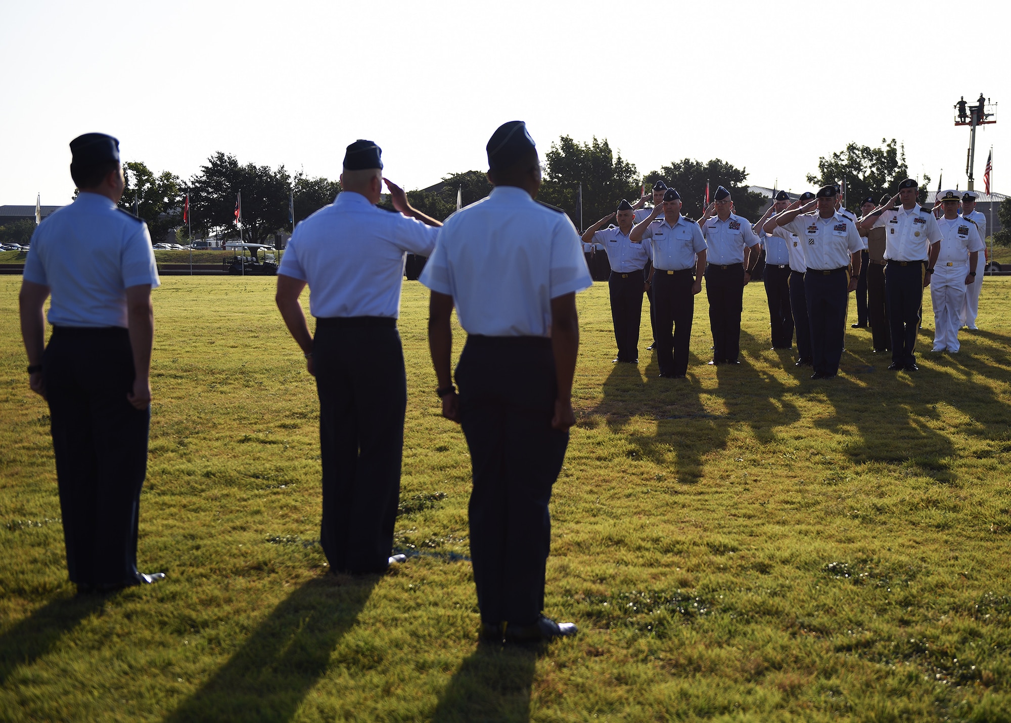 U.S. Air Force Col. Robert Ramirez, 17th Training Wing vice commander, salutes the formation during the 17th TRW change of command ceremony at the parade field on Goodfellow Air Force Base, Texas, June 28, 2019. More than 200 representatives from the Army, Navy, Air Force and Marine Corps stood in formation during the event to honor outgoing commander, Col. Ricky Mills, and welcome the incoming commander, Col. Andres Nazario. (U.S. Air Force photo by Staff Sgt. Chad Warren/Released)