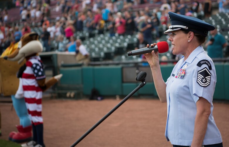 Master Sgt. Julie Bradley, United States Air Force Academy Band vocalist, sings the National Anthem before a Rocky Mountain Vibes baseball game at Military Appreciation Night in Colorado Springs, Colorado, June 27, 2019. There are four Military Appreciation Nights remaining in the Vibes season. (U.S. Air Force photo by Airman 1st Class Jonathan Whitely)