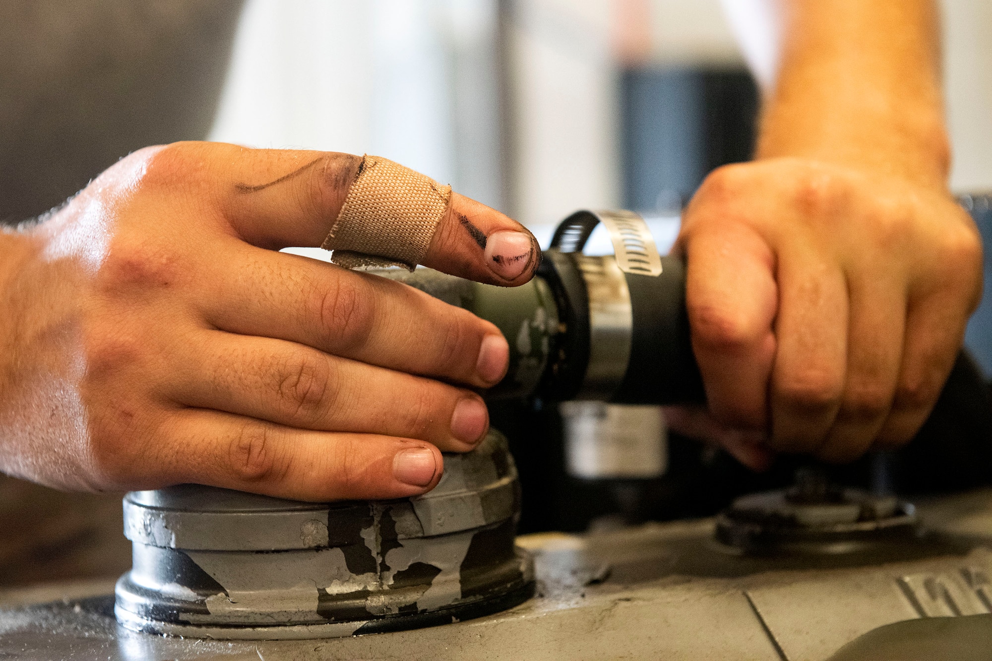 Senior Airman Hunter Gore, 23d Maintenance Squadron aerospace ground equipment (AGE) journeyman, performs inspections on a valve cover during a flight training day, June 21, 2019, at Moody Air Force Base, Ga. The training offered Gore a chance to improve his preventative maintenance efforts on the equipment AGE Airmen service. (U.S. Air Force photo by Senior Airman Erick Requadt)